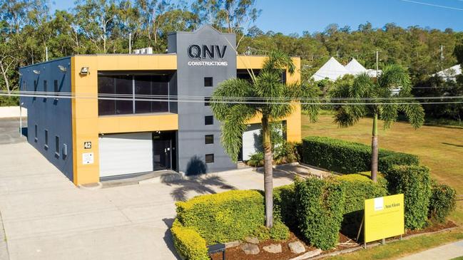 The former headquarters of troubled building company QNV Constructions at 42 Siganto Dr, Helensvale, is on the market. Photo: Supplied