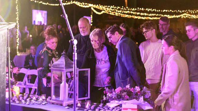 Toowoomba Mayor Geoff McDonald watches as family members of those lost light the first candle at the Protea Place candlelight vigil to mark Domestic and Family Violence Prevention Month at Gips Restaurant, Tuesday, May 13, 2025. Picture: Kevin Farmer