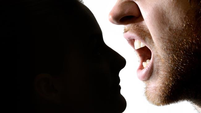 After seeing a text message that led him to believe his partner was cheating on him, a man started an argument with the woman before pushing her onto the bed, a court has heard.