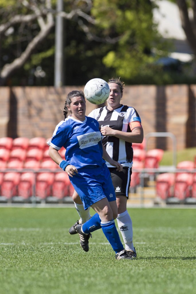 Penny Dukes (left) for Rockville and Kiama Gray for Willowburn in Toowoomba Football League Premier Women grand final at Clive Berghofer Stadium, Sunday, September 9, 2018. Picture: Kevin Farmer