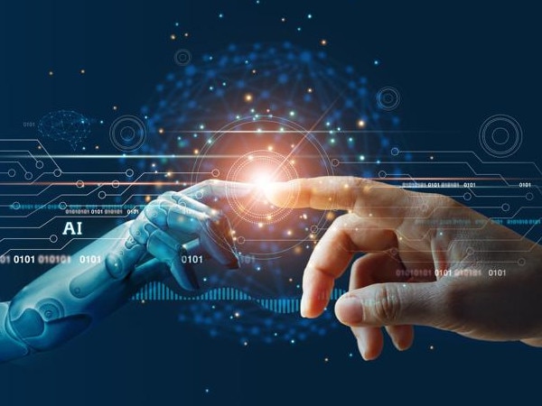 AI, Machine learning, Hands of robot and human touching on big data network connection background, Science and artificial intelligence technology, innovation and futuristic.