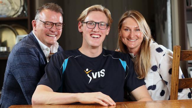 Mack Horton with his mum and dad, Andrew and Cheryl. Picture: Alex Coppel