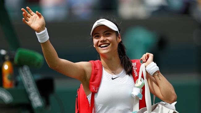 Britain’s Emma Raducanu waves to fans after her Wimbledon victory over Romania’s Sorana Cirstea. Picture: AFP