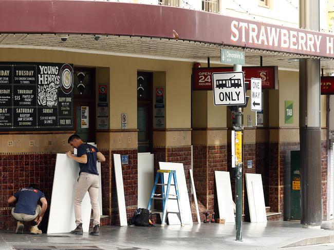 The Strawberry Hills Hotel has boarded up its windows and removed all alcohol. Pic: Sam Ruttyn