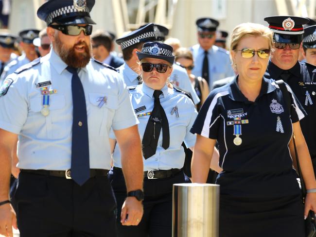 Mourners at the memorial service with full police honours for constables Rachel McCrow and Matthew Arnold at Brisbane Entertainment Centre. Picture: David Clark