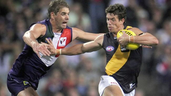 Troy Simmonds fends off Aaron Sandilands. Picture: Jackson Flindell