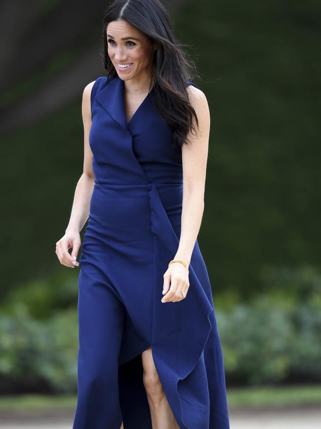 Meghan in the navy Dion Lee dress. Picture: Dominic Lipinski/Pool via AP