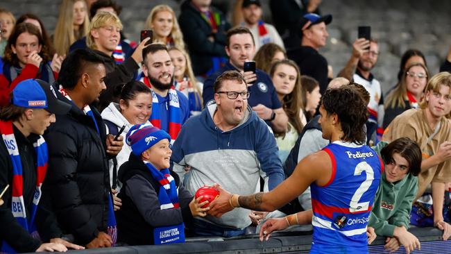 Jamarra Ugle-Hagan celebrates with Bulldogs fans after their Marvel Stadium win against the Lions. Picture: Getty Images