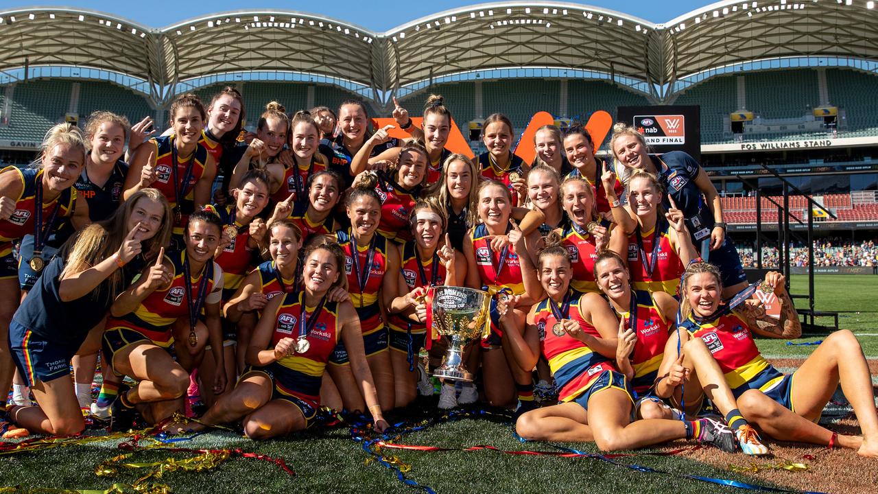 The Adelaide Crows pose for their premiership photo. Photo by Dylan Burns/AFL Photos via Getty Images.