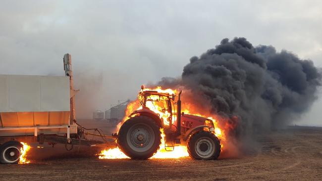 A tractor burns a few kilometres out of Edithburgh - the fire caused approximately $600,000 damage to machinery at the Giles family farm. Picture: Gabriel Polychronis