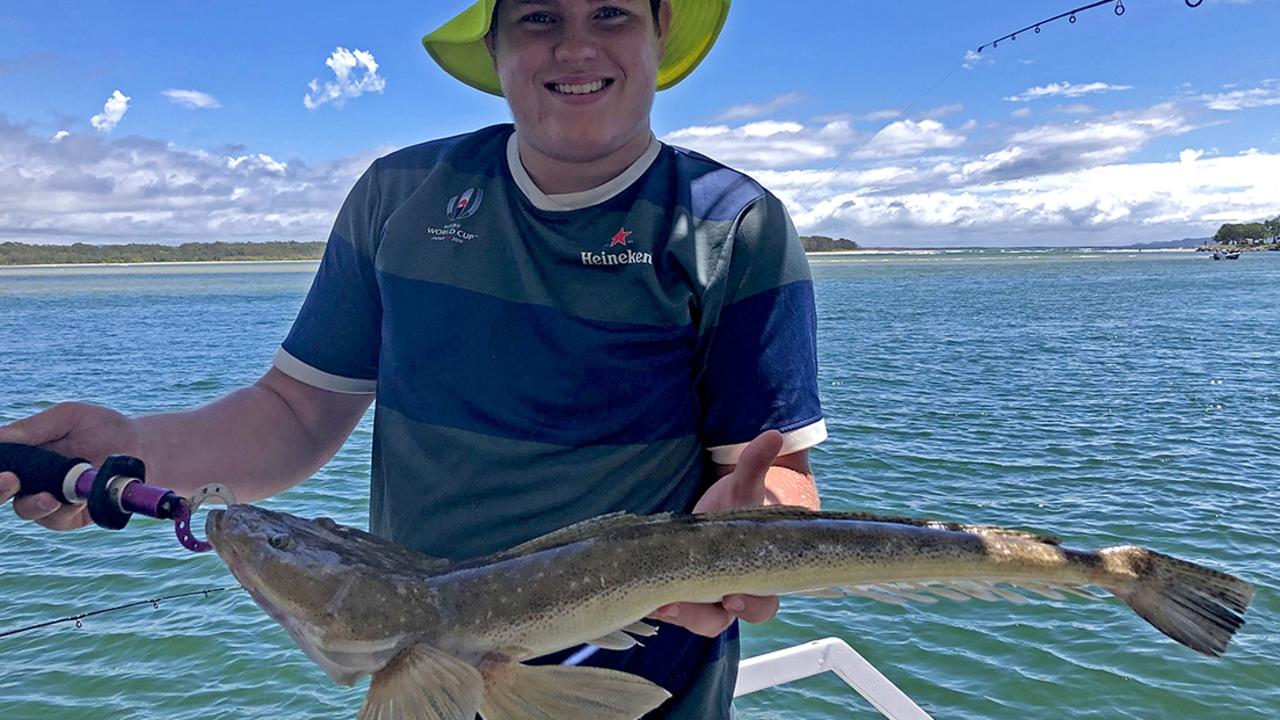 GOTCHA - Max from Brisbane caught and released this 76cm flathead while on a Noosa River Fishing Safari Photo: www.fishingnoosa.com.au