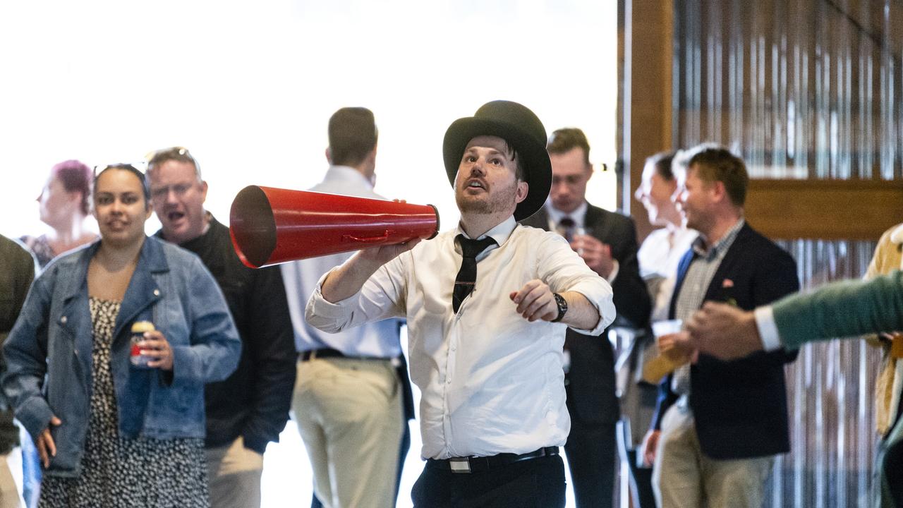 Ringkeeper Sheldon Rogers during two-up in the Goods Shed as part of Toowoomba Anzac Day commemorations, Monday, April 25, 2022. Picture: Kevin Farmer