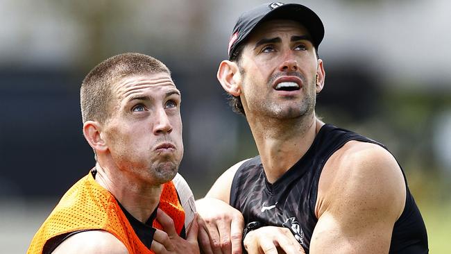 Darcy Cameron (left) and Brodie Grundy, pictured at Collingwood training, could team up as soon as Friday night’s clash with Melbourne. Picture: Getty Images