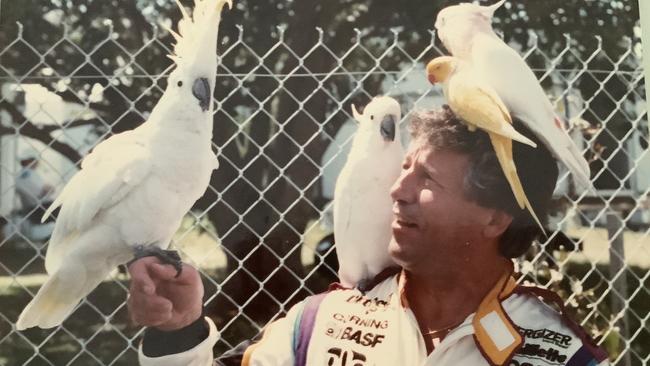 Henry the Cockatoo with Formula One world champion Mario Andretti