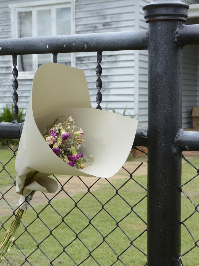 A small floral tribute hangs outside Krishna Chopra's home in Park Road, Crows Nest.