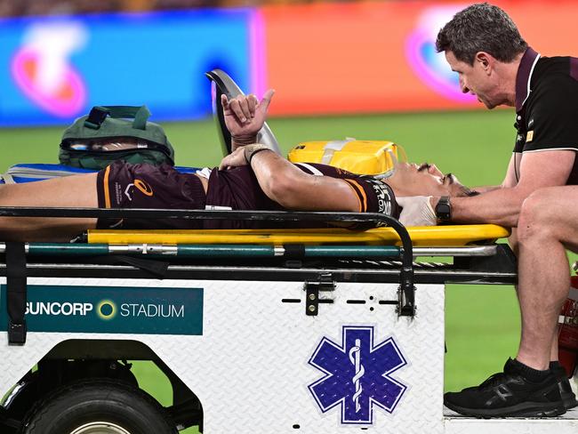 Brendan Piakura taken from the field on a stretcher. Picture: Bradley Kanaris/Getty Images