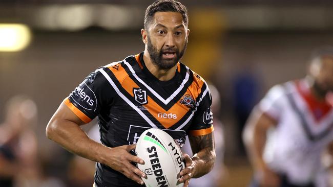 SYDNEY, AUSTRALIA - AUGUST 22: Benji Marshall of the Tigers makes a break during the round 15 NRL match between the Wests Tigers and the Sydney Roosters at Leichhardt Oval on August 22, 2020 in Sydney, Australia. (Photo by Cameron Spencer/Getty Images)