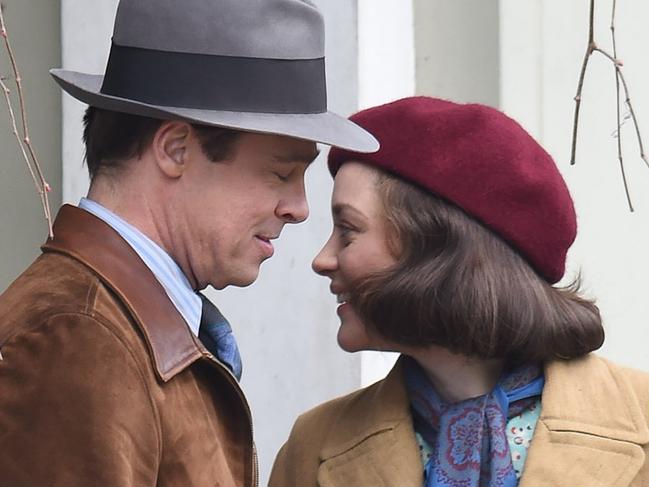 Brad Pitt and Angelina Jolie to divorce after 12 years together amid shock claims he cheated with co-star Marion Cotillard, pictured together on the recent film set in london. The Hollywood actress wants overall physical custody of their six children - not joint custody with Brad after citing irreconcilably differences in legal papers. The New York Post have claimed the 41-year-old actress hired a private investigator to spy on him on the set of his latest film — where they claim she learned he was cheating. Pictured: Brad Pitt, Marion Cotillard Ref: SPL1359035 200916 Picture by: Neil Warner / Splash News Splash News and Pictures Los Angeles: 310-821-2666 New York: 212-619-2666 London: 870-934-2666 photodesk@splashnews.com