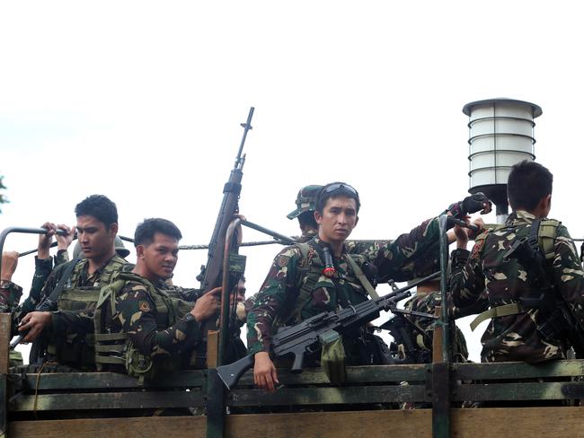 Soldiers head back to the frontlines in Marawi where a war is ongoing between the Philippines Army and the ISIS terrorists. Hundreds have lost their lives so far and thousands of civilians are now displaced. Picture: Gary Ramage