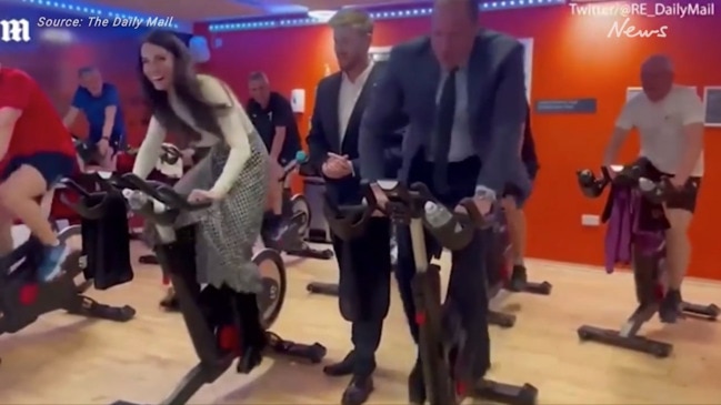 Kate Middleton beats Prince William on a bike