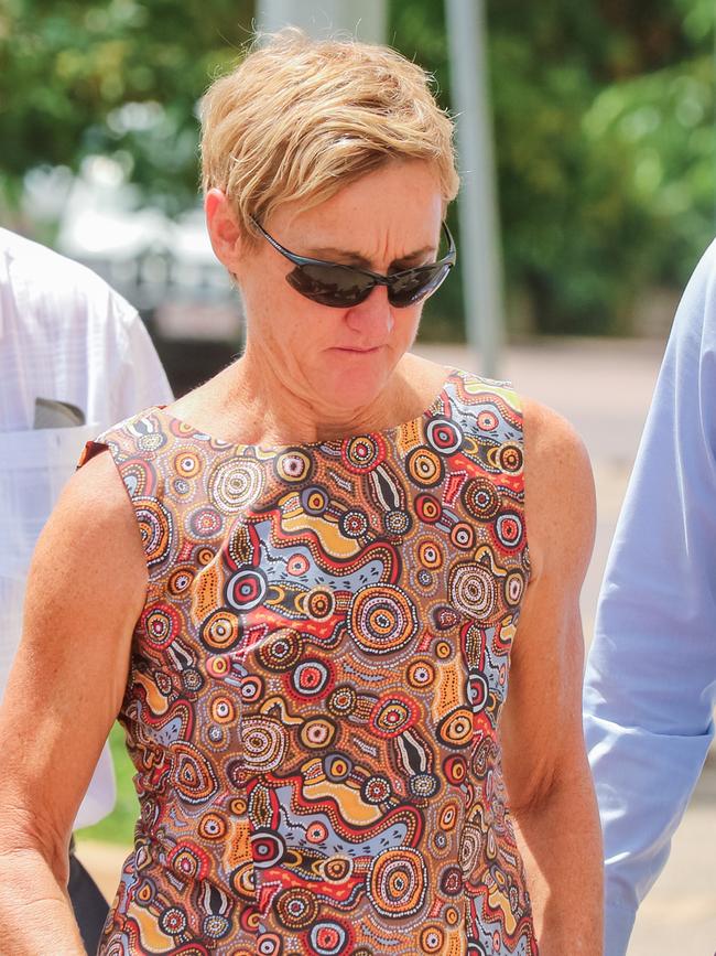 Former Children's Commissioner Colleen Gwynne, flanked by her legal team going into Darwin Magistrates Court. Picture: Glenn Campbell