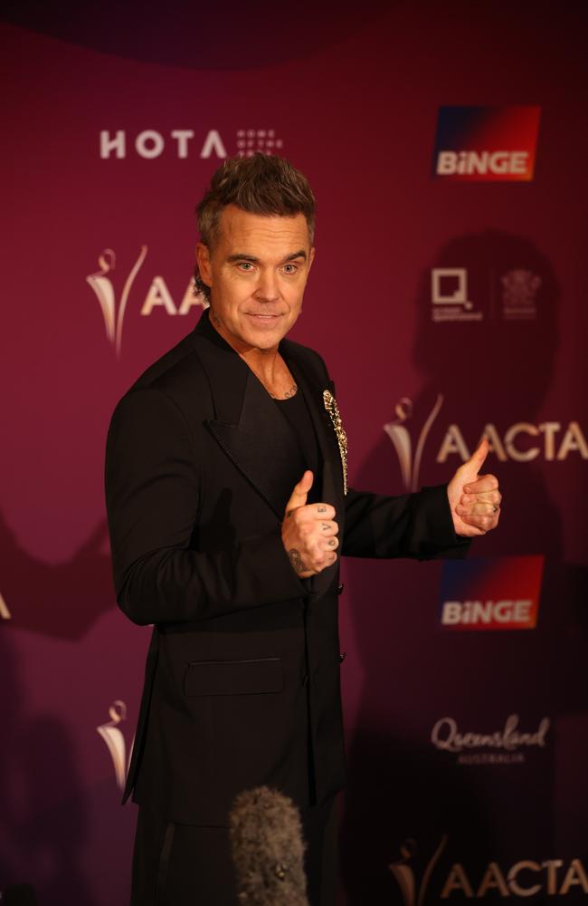 Robbie Williams on the red carpet at the Australian Academy of Cinema and Television Arts (AACTA) awards at the Home of the Arts on the Gold Coast. Picture: Annette Dew.