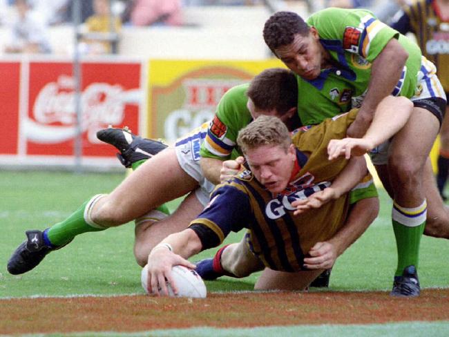 Garrick Morgan crosses for a Crushers try in Reserve grade at Suncorp Stadium.