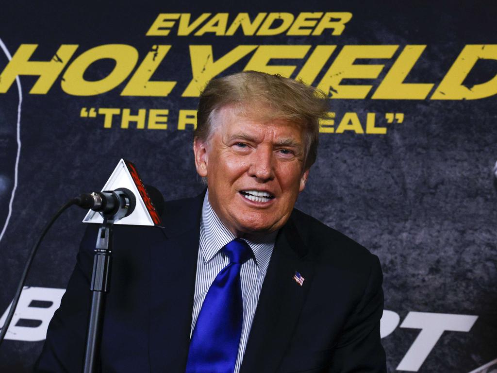 Former US President Donald Trump poses for a photo prior to the fight between Evander Holyfield and Vitor Belfort in 2021. Photo: AFP.