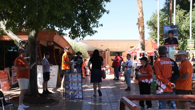 Political party candidates and volunteers at the Alice Springs Town Council chambers on voting day for the 2025 federal election, May 3, 2025. Picture: Gera Kazakov