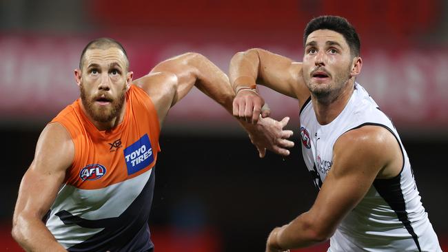 AFL Round 15. GWS Giants vs Carlton at Metricon Stadium, Gold Coast. 03/09/2020... Shane Mumford of the Giant and Marc Pittonet of the Blues . Pic: Michael Klein