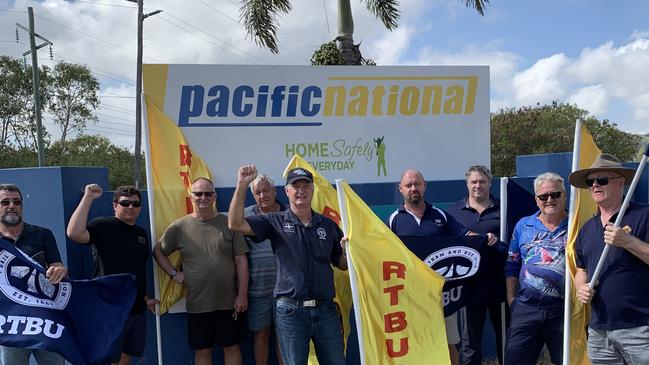 Pacific National staff including Townsville train drivers took industrial action on Tuesday to gain better working conditions. L to R: Paul White, Jay Cole, Ken Sturgess, Rod Galton, Les Moffitt (centre), Tommy Martin, Brett Haselden, Doug Hellyer, and Simon Crisp.