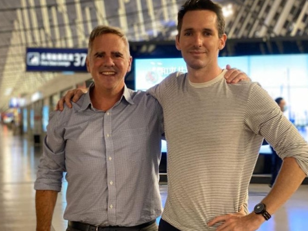 The Australian Financial Review's journalist Michael Smith (left) and the ABC’s journalist Bill Birtles flew out of Shanghai on Monday night.