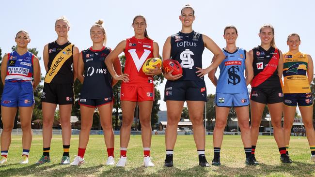 SANFLW 2024 captains, from left, Shelby Smith (Central District), Sam Franson (Glenelg), Jess Edwards (North Adelaide), Stephanie Simmonds (Norwood), Brianna Cleggett (South Adelaide), Kate Harris (Sturt), Madi Russell (West Adelaide) and Annie Falkenberg (Woodville-West Torrens) at the season launch at Prospect Oval on Wednesday. Picture: David Mariuz (SANFL)