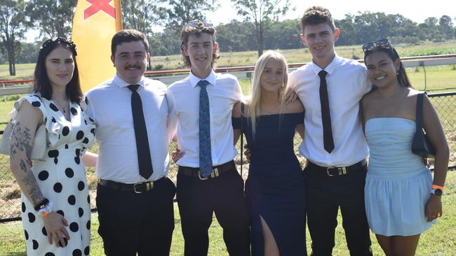 Cloe Letts, Michael Malick, Brodie Heintze, Monique Weegenaar, Ethan Watson and Natcha Chaipinit at the Yeppoon race day at Keppel Park racecourse on April 26, 2025.