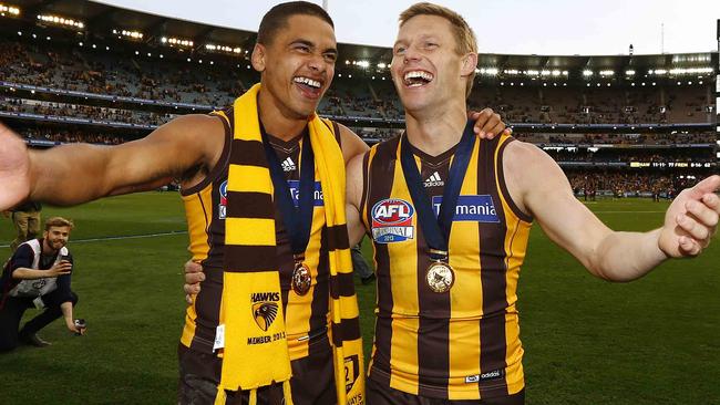 Brad Hill and Sam Mitchell celebrate their premiership win in 2013. Picture: Michael Klein