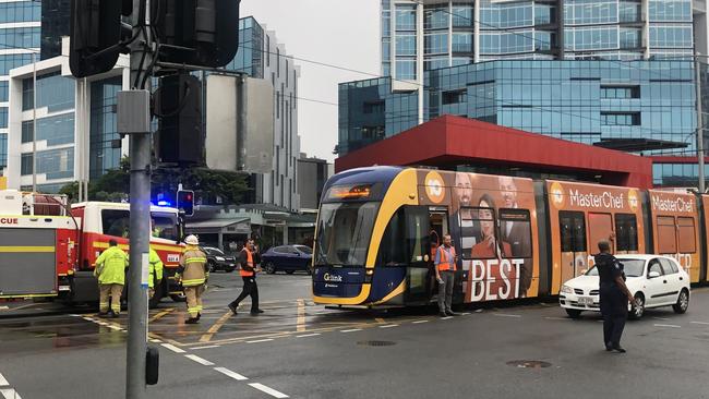 Emergency services on scene following a collision between a car and a tram carriage in March last year. Picture: Kyle Wisniewski.