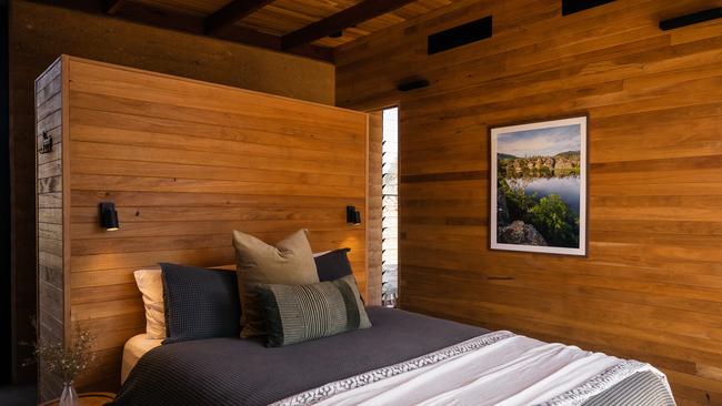 Timber and rammed-earth walls are central elements of the design. Picture: Lee Besser