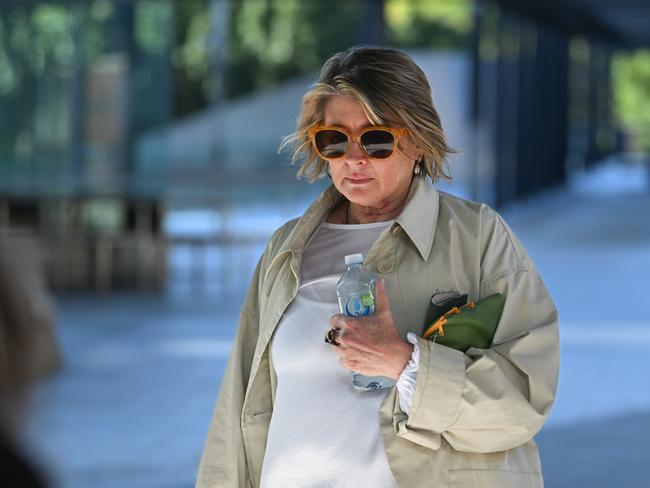 Triple-0 operator Katherine Beilby leaves the Brisbane Coroners Court after giving evidence late last month. Picture: Dan Peled