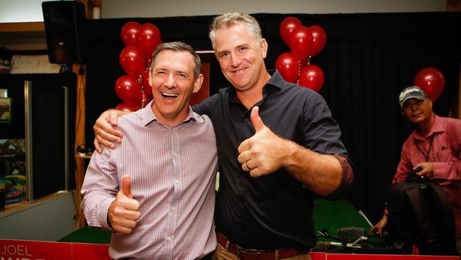 Chief Minister Michael Gunner and NT Labors Joel Bowden when the latter won the seat of Johnston on February 29, weeks before shaking hands was outlawed due to coronavirus. Picture GLENN CAMPBELL