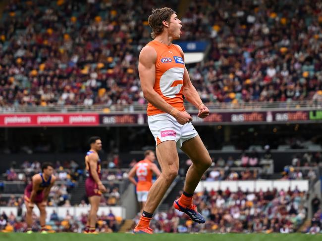 Aaron Cadman celebrates a final term goal against the Lions. Picture: Albert Perez/AFL Photos