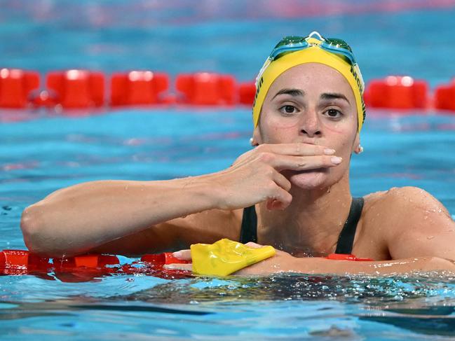 McKeown celebrates winning the 100m backstroke. Picture: Jonathan Nackstrnd / AFP