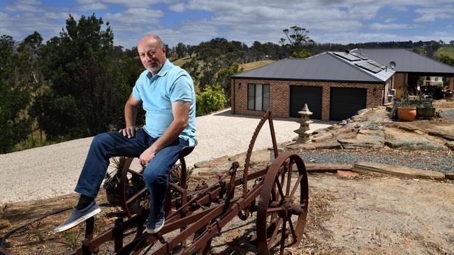 Enrico Sgarbi pictured at his newly build home in 2020, a year after the blaze. Picture: Tricia Watkinson