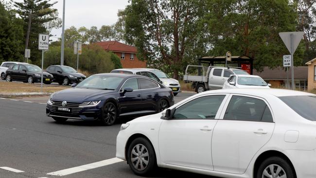 Cars turn from Kissing Point Rd on to Quarry Rd. Picture: Angelo Velardo