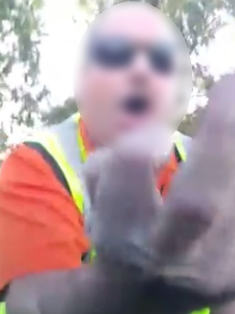 Screenshots from a video filmed by a woman who was verbally attacked by a Perth TNT truck driver in a road rage incident.