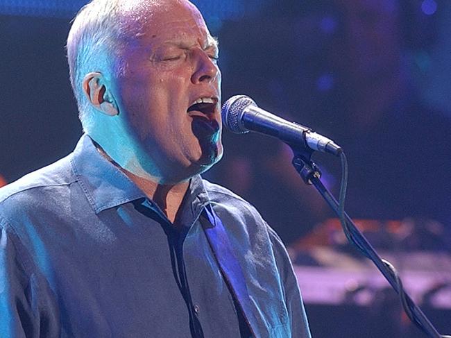 Pink Floyd's Dave Gilmour plays Fender Stratocaster 001 at the Strat Pack Concert at Wembley Arena, Sept. 24, 2004. The Strat Pack concert was Celebrating 50yrs of the iconic guitar at a charity concert for Nordoff-Robbins Music Therapy. (AP PicRichard/Lewis) music groups bands performing