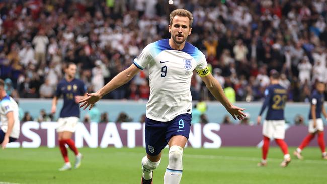 Harry Kane of England celebrates after scoring during the quarterfinal match between England and France at Al Bayt Stadium. (Photo by Julian Finney/Getty Images)