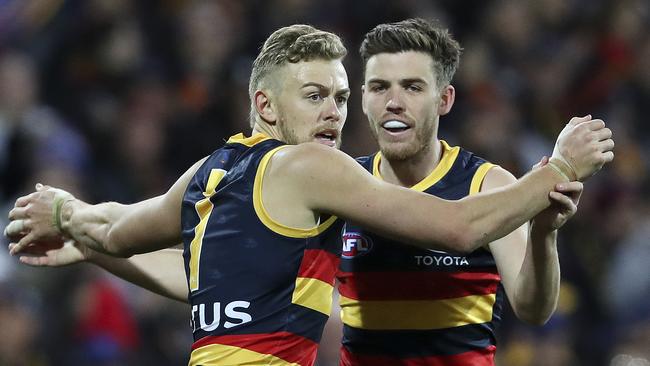 Hugh Greenwood celebrates a goal with Paul Seedsman. Picture SARAH REED