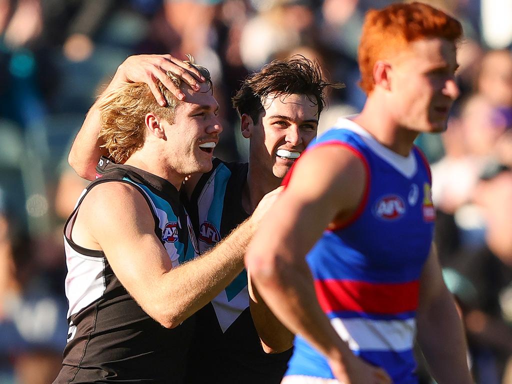 ADELAIDE, AUSTRALIA - JULY 06: Jason Horne-Francis of the Power celebrates a goal with Connor Rozee during the 2024 AFL Round 17 match between the Port Adelaide Power and the Western Bulldogs at Adelaide Oval on July 05, 2024 in Adelaide, Australia. (Photo by Sarah Reed/AFL Photos via Getty Images)