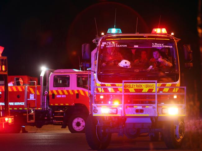 Pictured are RFS from Horsley Park at Greystanes in Sydney following he outbreak of a fire in bushland near the Prospect Reservoir. Horsley Park tragically lost 2 RFS members when their truck crashed responding to a fire recently.Picture: Richard Dobson