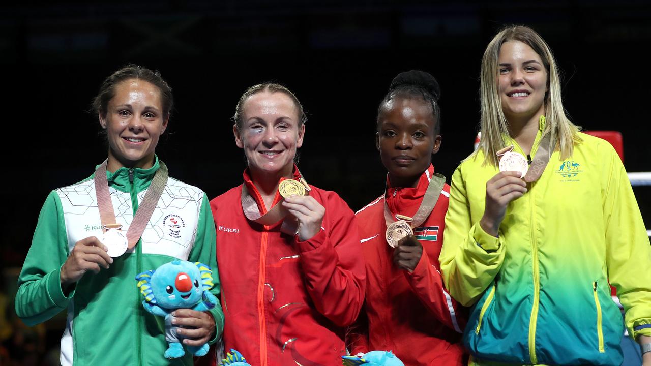 Northern Ireland's Carly McNaul, England's Lisa Whiteside, Kenya's Christine Ongare, and Australia's Taylah Robertson (bronze) after the Women's Flyweight final at the 2018 Commonwealth Games on the Gold Coast.